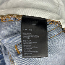 Load image into Gallery viewer, Amiri MX1 Ripped Skinny Black Patch Jeans Size 36”
