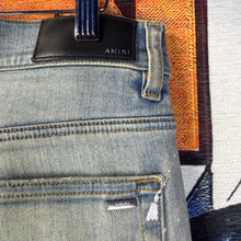 Load image into Gallery viewer, Amiri MA Quad Artpatch Skinny Jeans Size 30”
