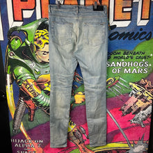 Load image into Gallery viewer, Amiri MX1 Ripped Skinny Jeans Size 33”
