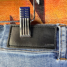 Load image into Gallery viewer, Amiri Ripped Blue Jeans Size 36”
